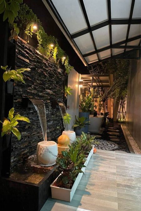 🌿 نافورة جدارية مزدوجة بإضاءة دافئة